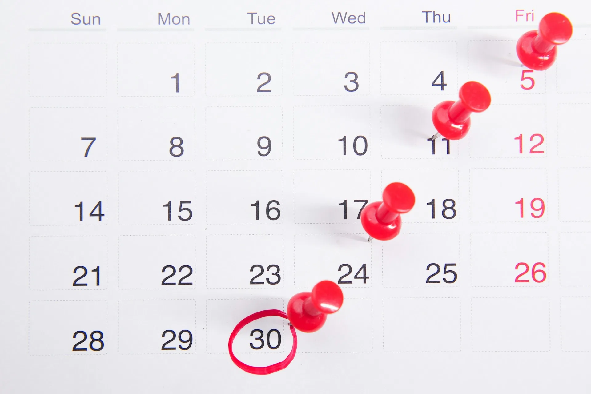 calendar with red pins